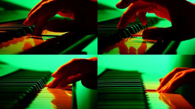 在彩色钢琴合成器键盘上演奏