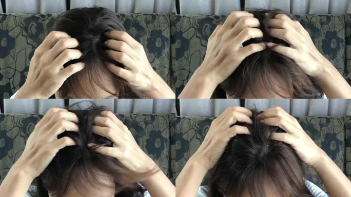 亚洲妇女挠头发痒