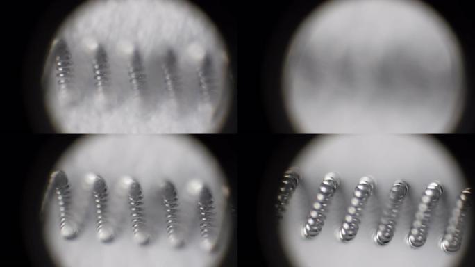 钨丝在显微镜下，放大100倍。钨金属纹理