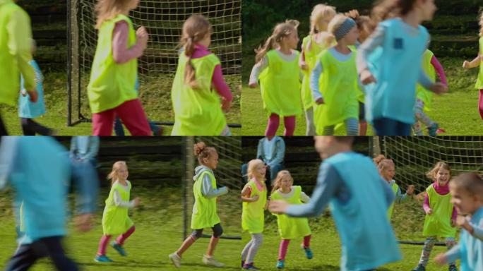在小联盟足球练习之前，孩子们在圈子里奔跑
