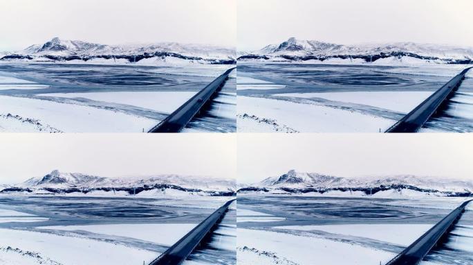 冰岛一座冰冻的蓝色河流的鸟瞰图