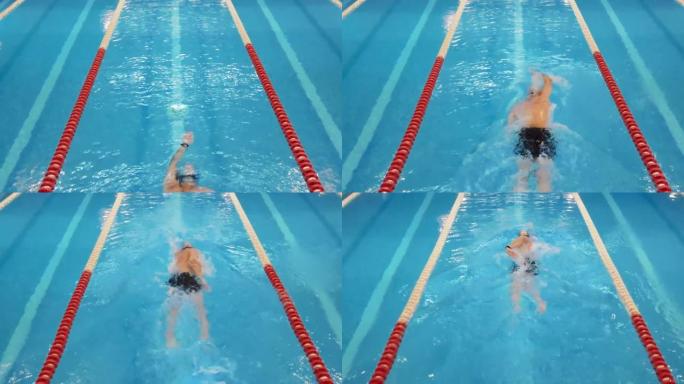 专业游泳者的空中无人驾驶俯视图，在游泳池游泳。高质量4k镜头