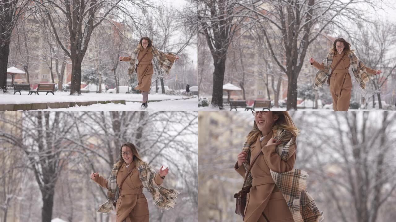 宁静的女人在下雪时奔跑，玩得很开心