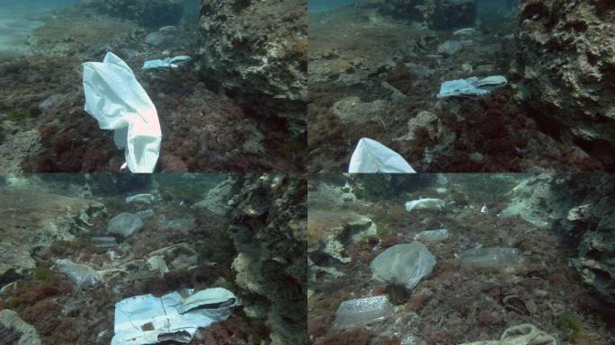 塑料污染，海底有很多塑料。慢动作，瓶子，袋子和其他塑料碎片在海底。欧洲地中海的塑料垃圾环境污染问题。