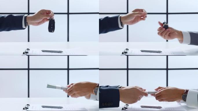 特写手给车钥匙和钱贷款信贷金融、租赁和租赁概念