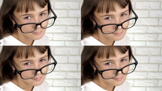一个戴眼镜的女学生的肖像。