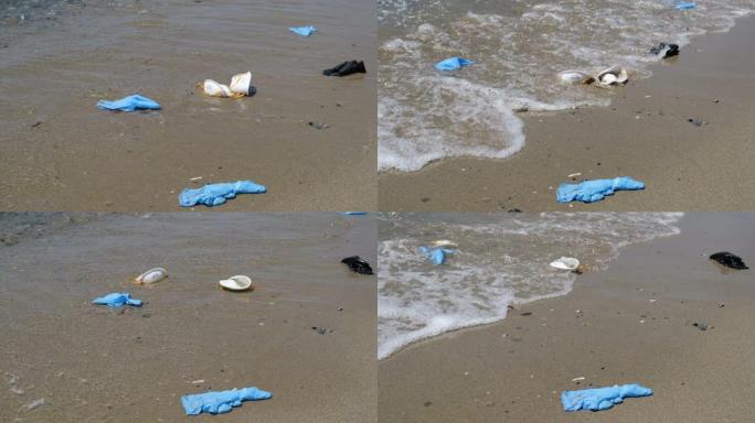 病毒口罩和塑料手套漂浮在海水海岸，冠状病毒污染