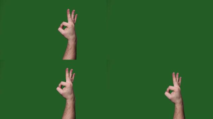 Chromakey。绿色屏幕。男人的手在做什么。