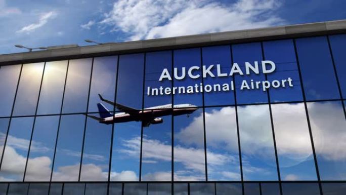 飞机降落在新西兰奥克兰机场，在航站楼中镜像