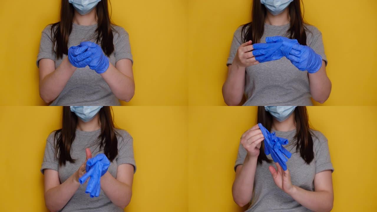 戴着防护面具的年轻女性的短截片会移除医用手套，并将其扔进垃圾桶，隔离在黄色工作室背景上，并带有广告复
