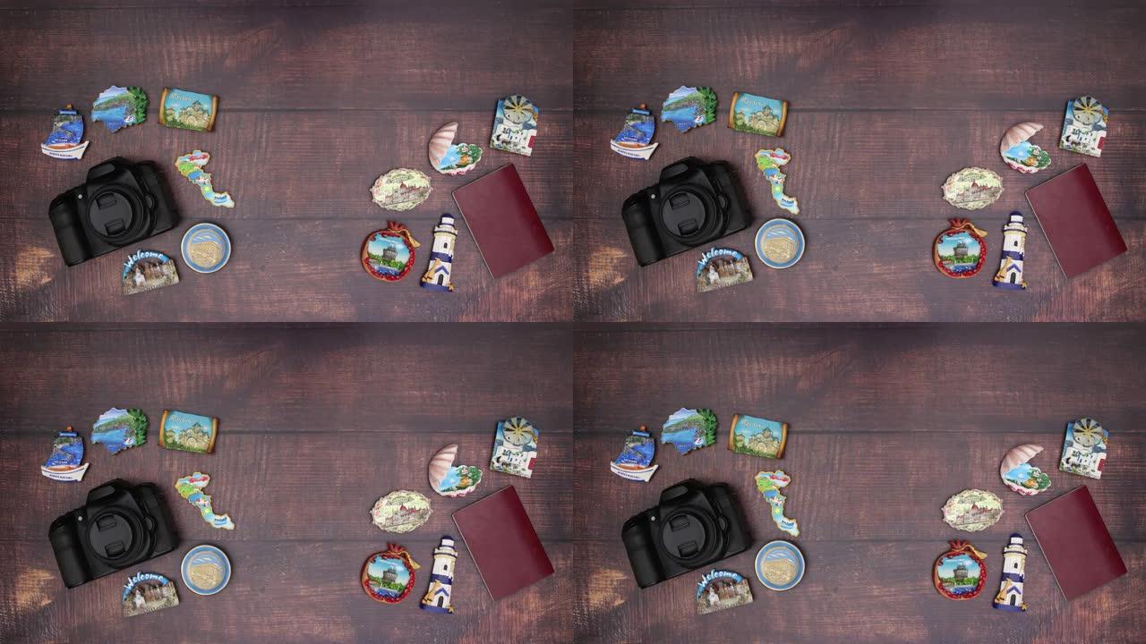 木制桌子上带旅行磁铁的相机护照-停止运动