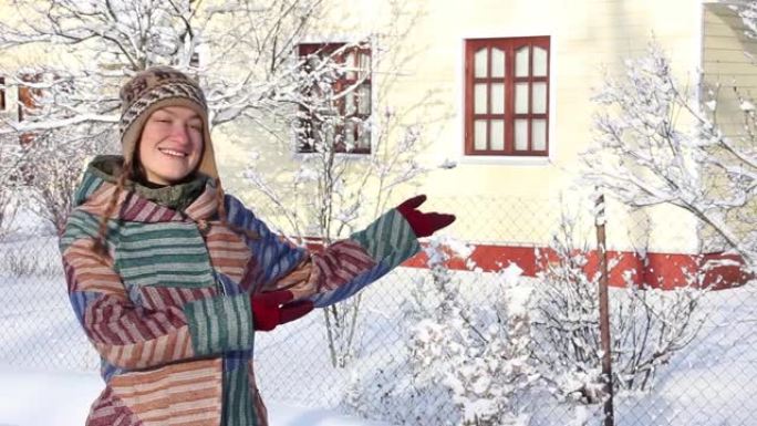俄罗斯冬季指向乡间别墅的女孩的肖像