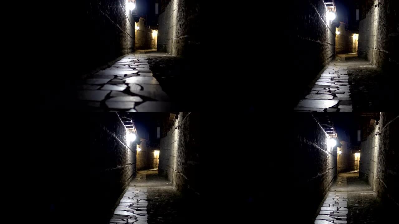 神秘的狭窄小巷，夜晚有石制路面灯笼
