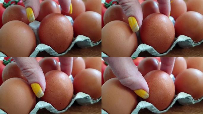 用手拿一个鸡蛋