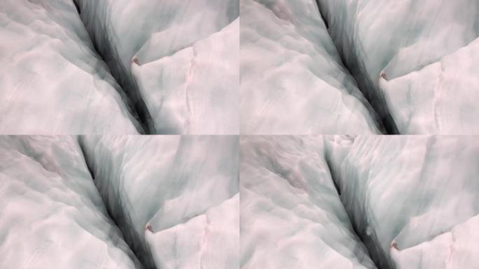 新西兰白雪皑皑的寒冷山脉的冰川裂缝。