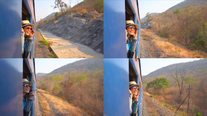 旅游女性在火车上旅行，微笑而有趣地在轨道铁路上运行的火车上运输
