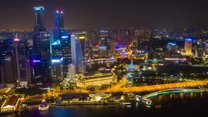 新加坡城市夜间照明飞行在著名的滨海湾市中心空中全景4k延时