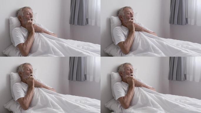 祖父或老人失去了记忆，并试图记住坐在白色房间的床上