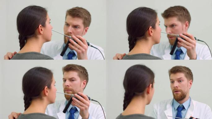 耳鼻喉科医生用电子内窥镜检查病人