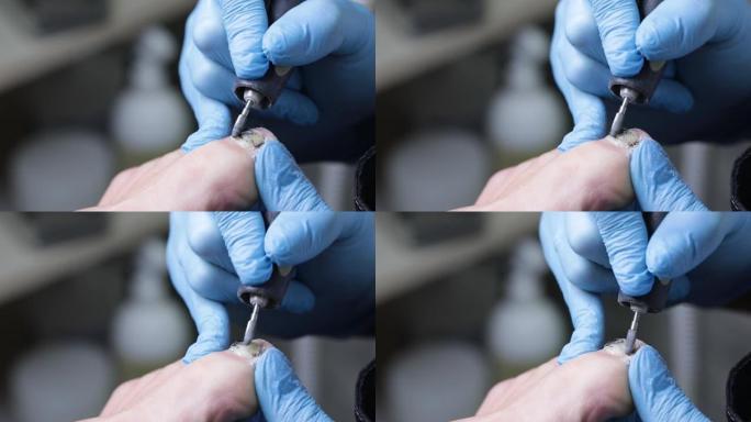 用硬质合金刀具去除指甲上的旧凝胶。
