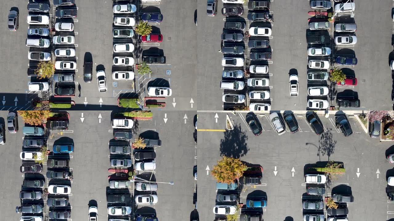 带有各种彩色车辆的停车场的俯视图