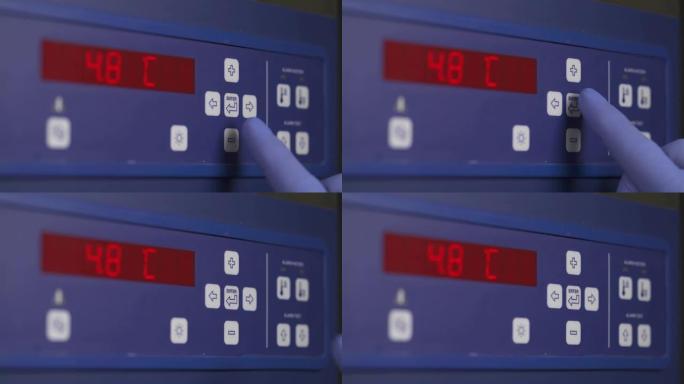 厨房烤箱温度控制面板。面包店工作的烤箱炉子上的温度计。