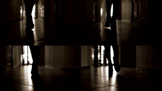 跟随穿着高山鞋的无法辨认的女人的脚步，沿着黑暗走廊的人行道走