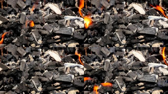 背景中燃烧的木炭烤架