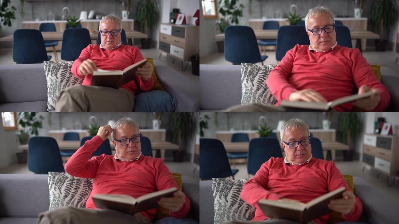 老人在沙发上放松，在家看书