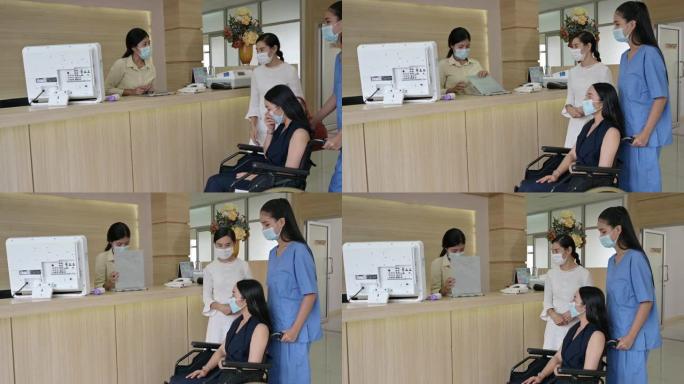 戴口罩的病人和姐姐预约接待员在医院接受治疗