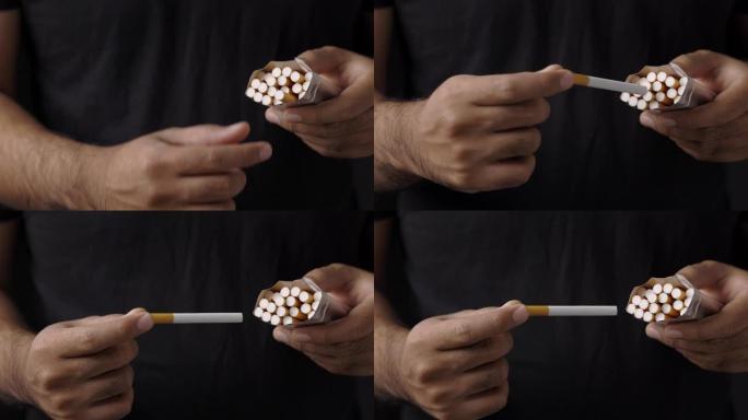一名男子从包里掏出一支烟，正要抽烟。世界无烟日。