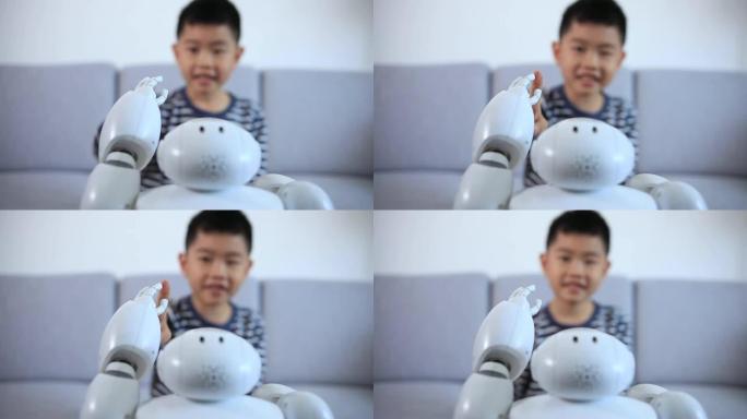 聪明的男孩用机器人问候