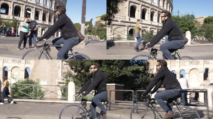年轻的潮人在阳光明媚的日子在罗马斗兽场骑自行车慢动作摄影车steadycam