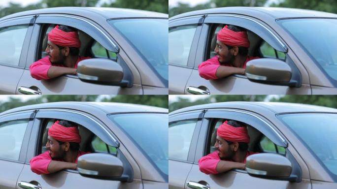 拥有新车的年轻印度农民