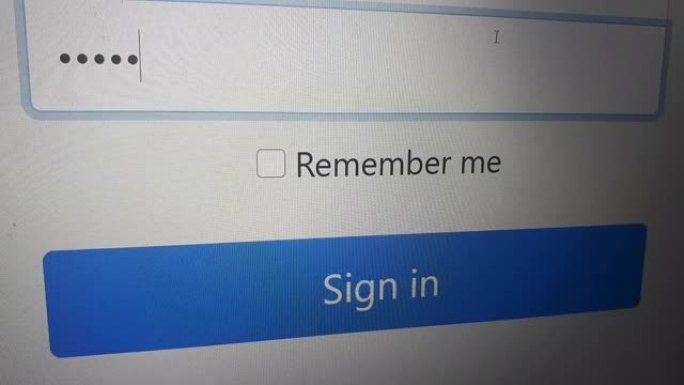 特写镜头进入密码。有人在电脑屏幕上输入密码。登录你的帐户。在登录页面输入密码