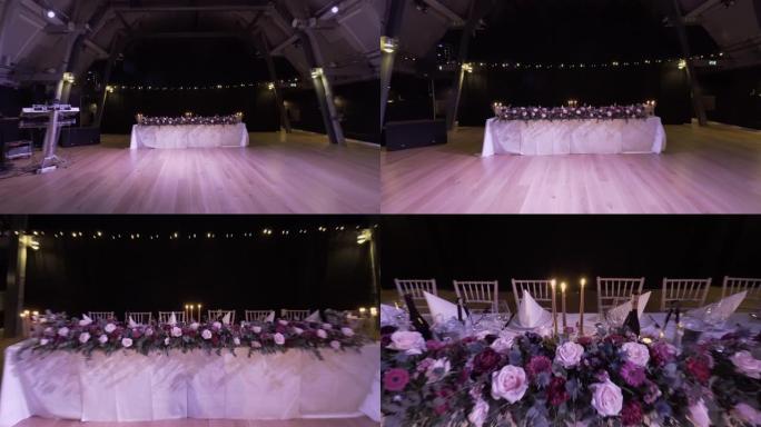 婚礼大厅装饰的内部为客人准备。举行仪式和婚礼的漂亮房间。婚礼概念。豪华时尚婚宴紫色装饰，昂贵的大厅。
