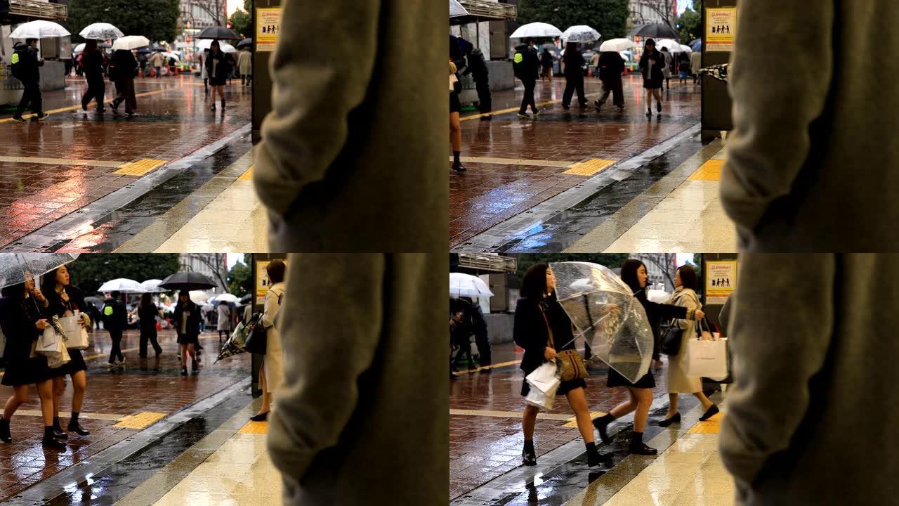 东京涩谷穿越rainny day的行人