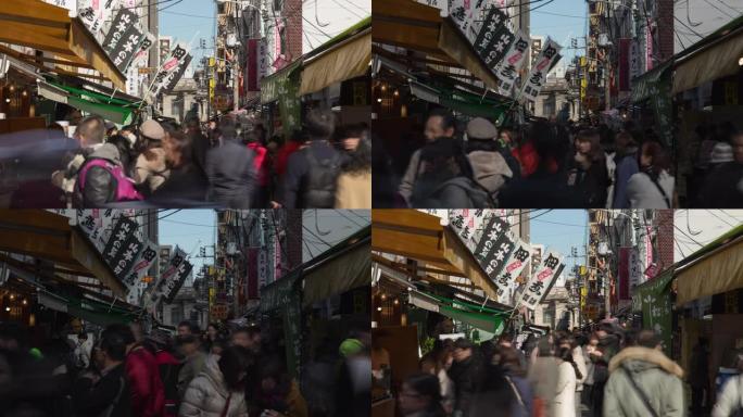 筑地鱼市场，东京，日本-在著名的东京鱼市场的摊位周围熙熙攘攘的人群