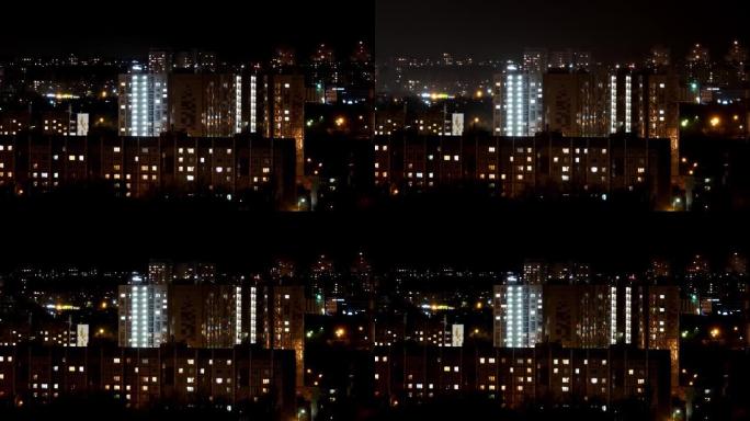 延时夜城市。沃罗涅日市的睡眠区。打开和关闭窗户的灯。晚上用电。城市景观