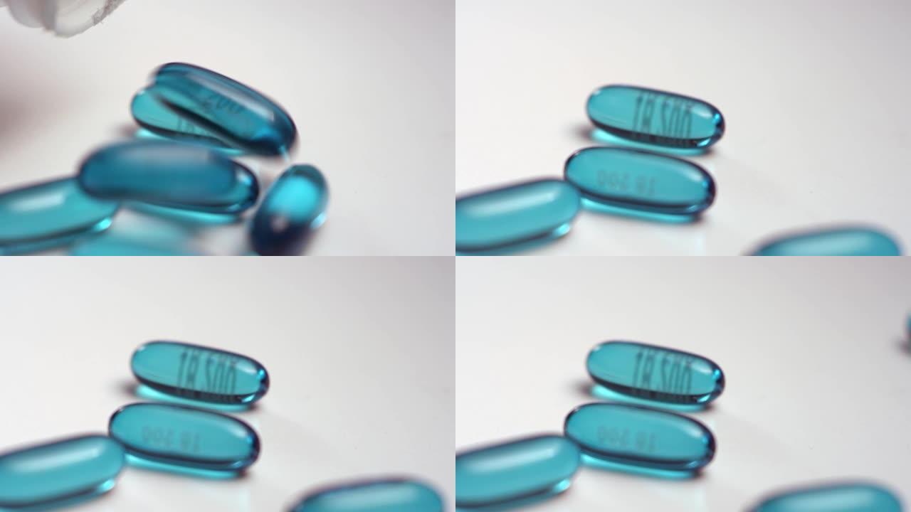 蓝色布洛芬液体凝胶药丸从药瓶中倒出并散布在白色表面上的宏观特写