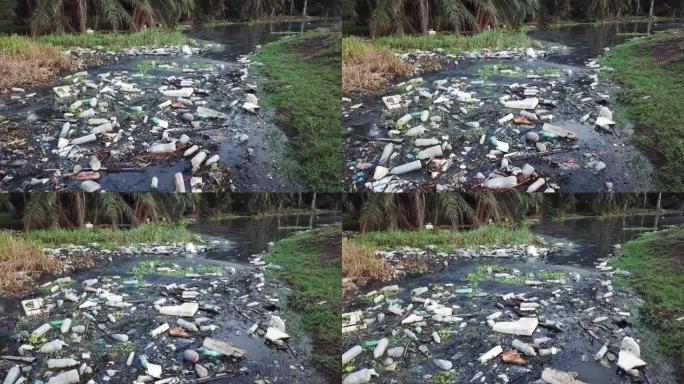 走向充满垃圾的黑暗河流