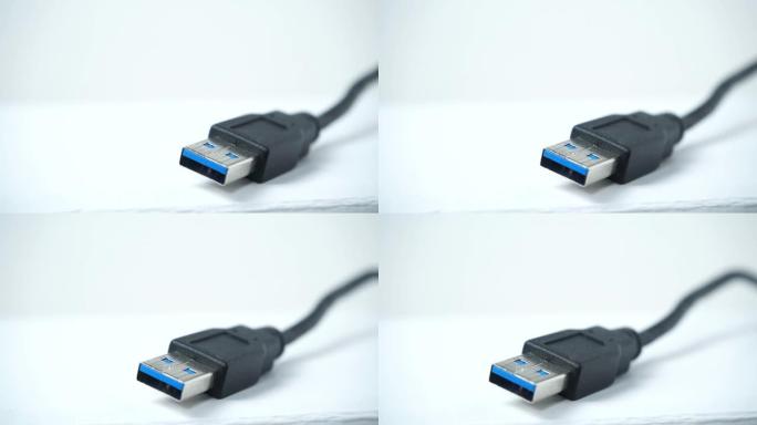 白色4K上的黑色USB电缆插头