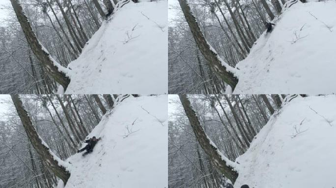 士兵用战术背包滚下积雪覆盖的斜坡