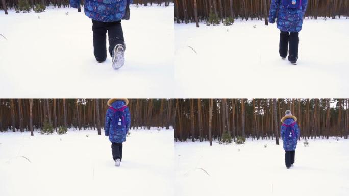女孩在树林中慢慢走过雪地