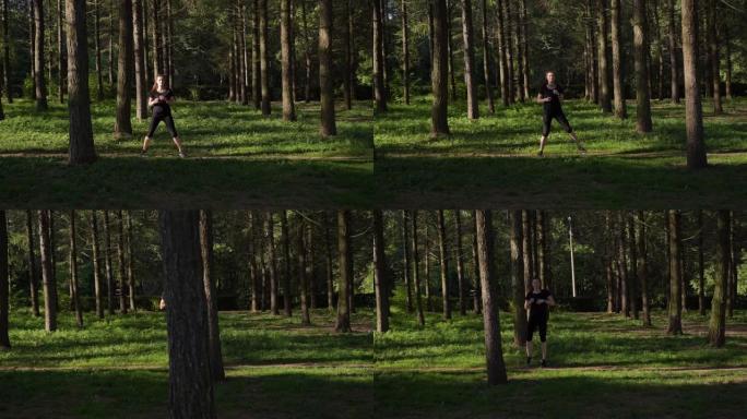 早晨，一名穿着黑色制服的妇女在森林公园里参加运动。