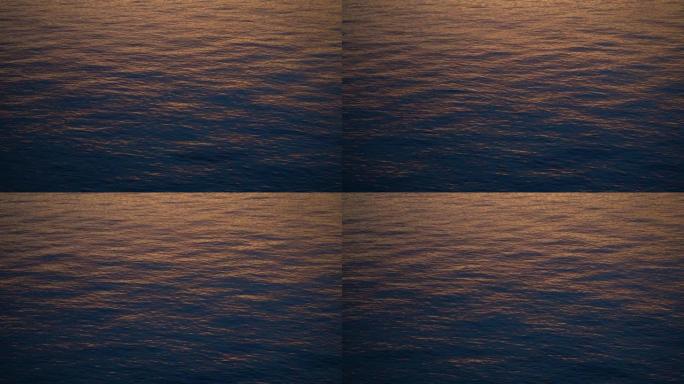 黄金时段的海浪和咸水来自海洋的蓝色和橙色水