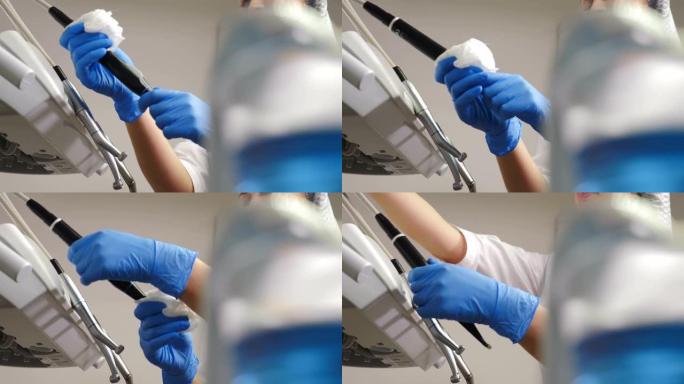 牙科助手用消毒液擦拭医疗设备和工具。牙科医疗机构的加工、清洁、消毒和消毒，经营医疗机构。4 k