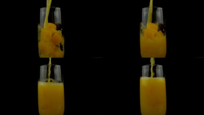 慢动作将橙子，柑桔，柑桔汁倒入带有冰块的玻璃杯中。