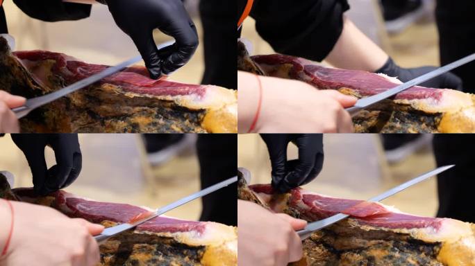 厨师用切片刀将火腿肉切成薄片特写