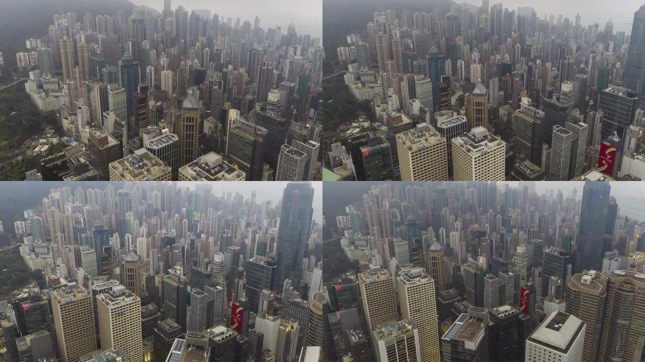 香港岛城市中心区多莉在大厦的空中俯视日时间推移过度拍摄场景4k视频